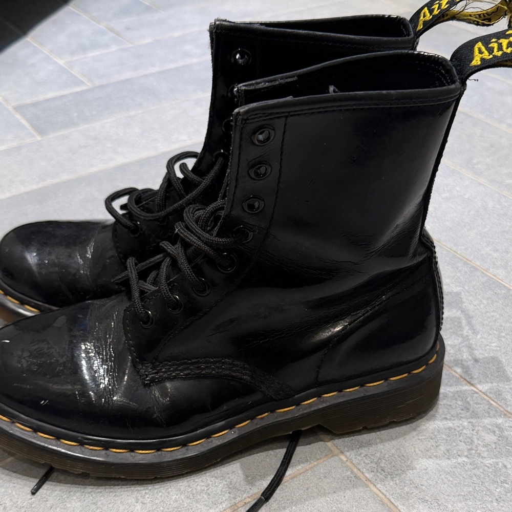 Dr. Martens Black Leather Lace-Up 8-Eye Boots with Yellow Welt Stitching